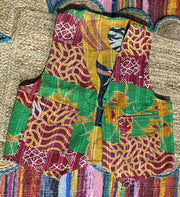 Handcrafted kantha quilt showcasing vibrant patterns as a perfect addition to sustainable fashion home décor.